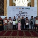 Madina Iman Wisata Group Salurkan Dana Zakat untuk 1500 Anak Yatim dan Dhuafa