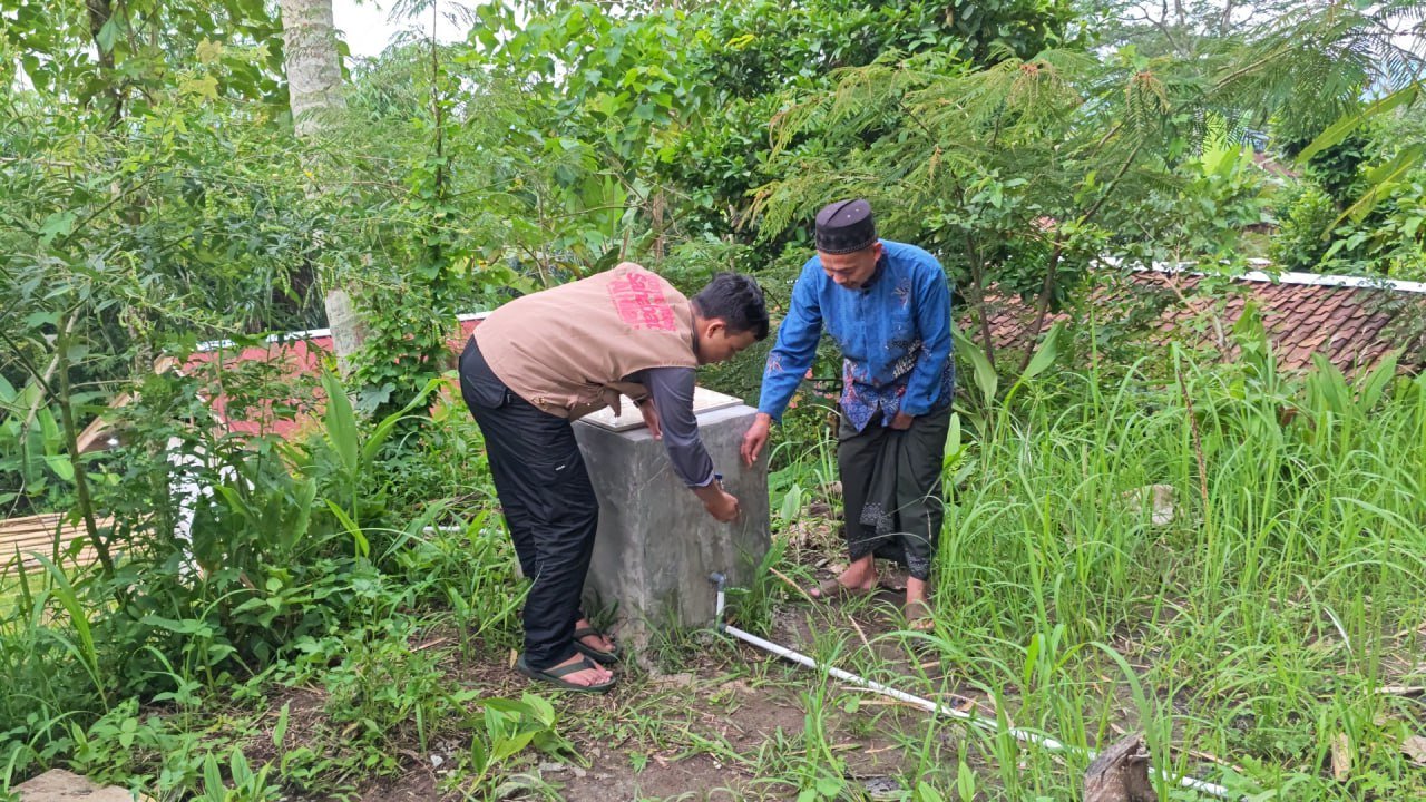 A group of people standing next to a concrete block AI-generated content may be incorrect.