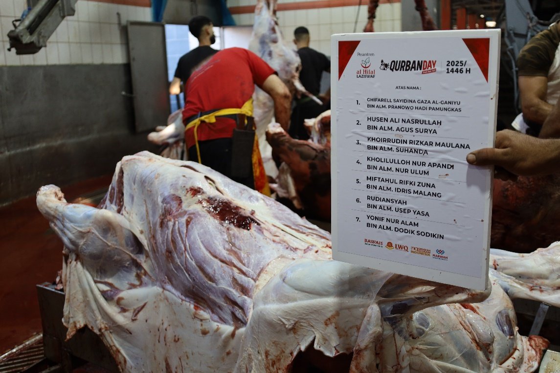 A butchers cutting meat in a butchery room AI-generated content may be incorrect.