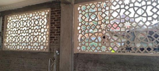 A wall with a pattern on it AI-generated content may be incorrect.