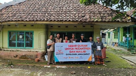 A group of people standing in front of a house holding a banner AI-generated content may be incorrect.