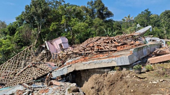 A pile of rubble and debris AI-generated content may be incorrect.