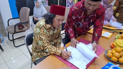 A person and person sitting at a table writing on paper AI-generated content may be incorrect.