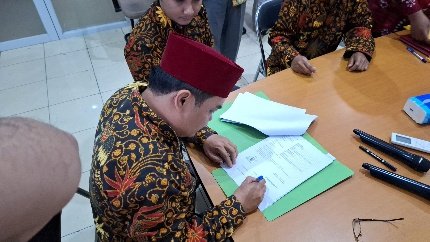 A person writing on a piece of paper AI-generated content may be incorrect.