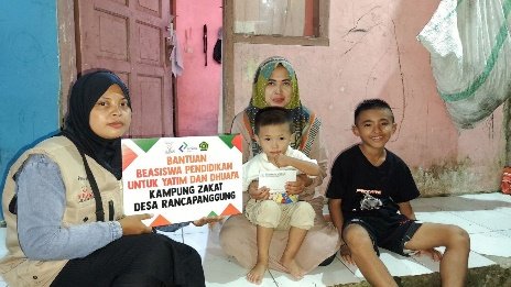 A group of people sitting on the floor holding a sign AI-generated content may be incorrect.