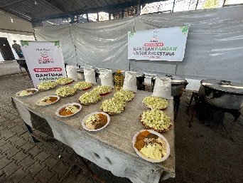 A table with plates of food on it

AI-generated content may be incorrect.