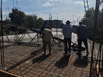 A group of men standing on a construction site

AI-generated content may be incorrect.